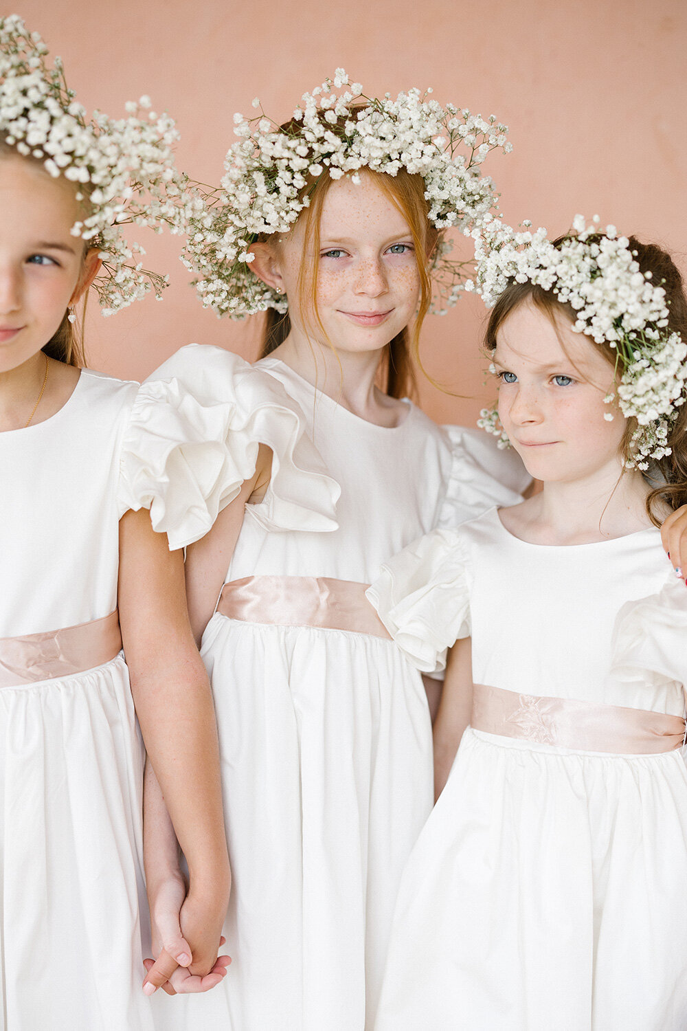 fine art photography of flowergirls with baby breath wreath mallorca