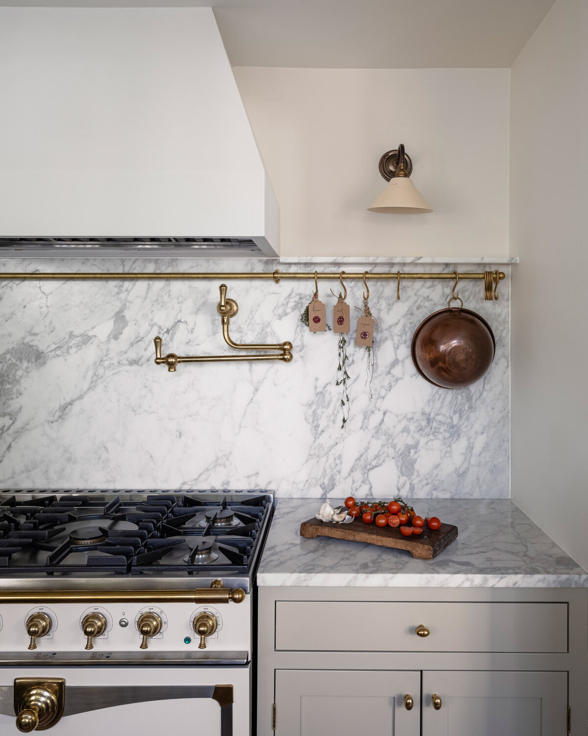 Marble-countertop-brass-hardware-copper-pots