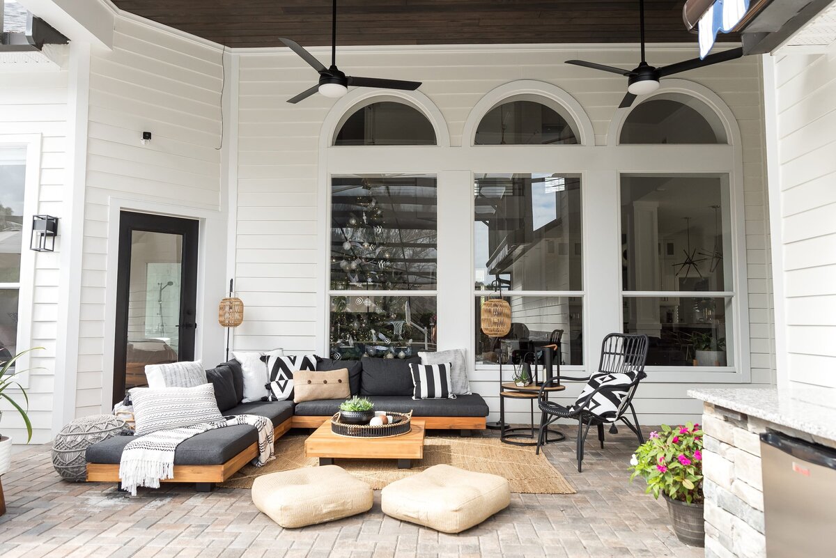 dewine design orlando interior designer modern lakehouse patio with sectional and large windows