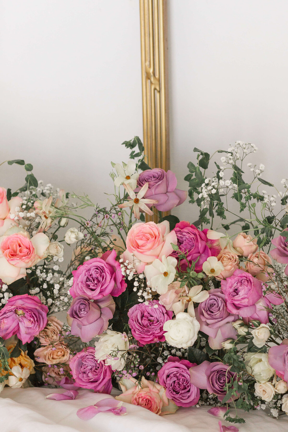 blush, pink and purple roses in floor floral display