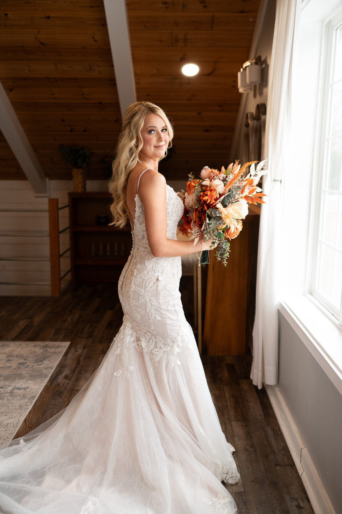 A portrait of a bride in the bridal suite just before her wedding at Stokes Family Farm in Greenville, North Carolina.