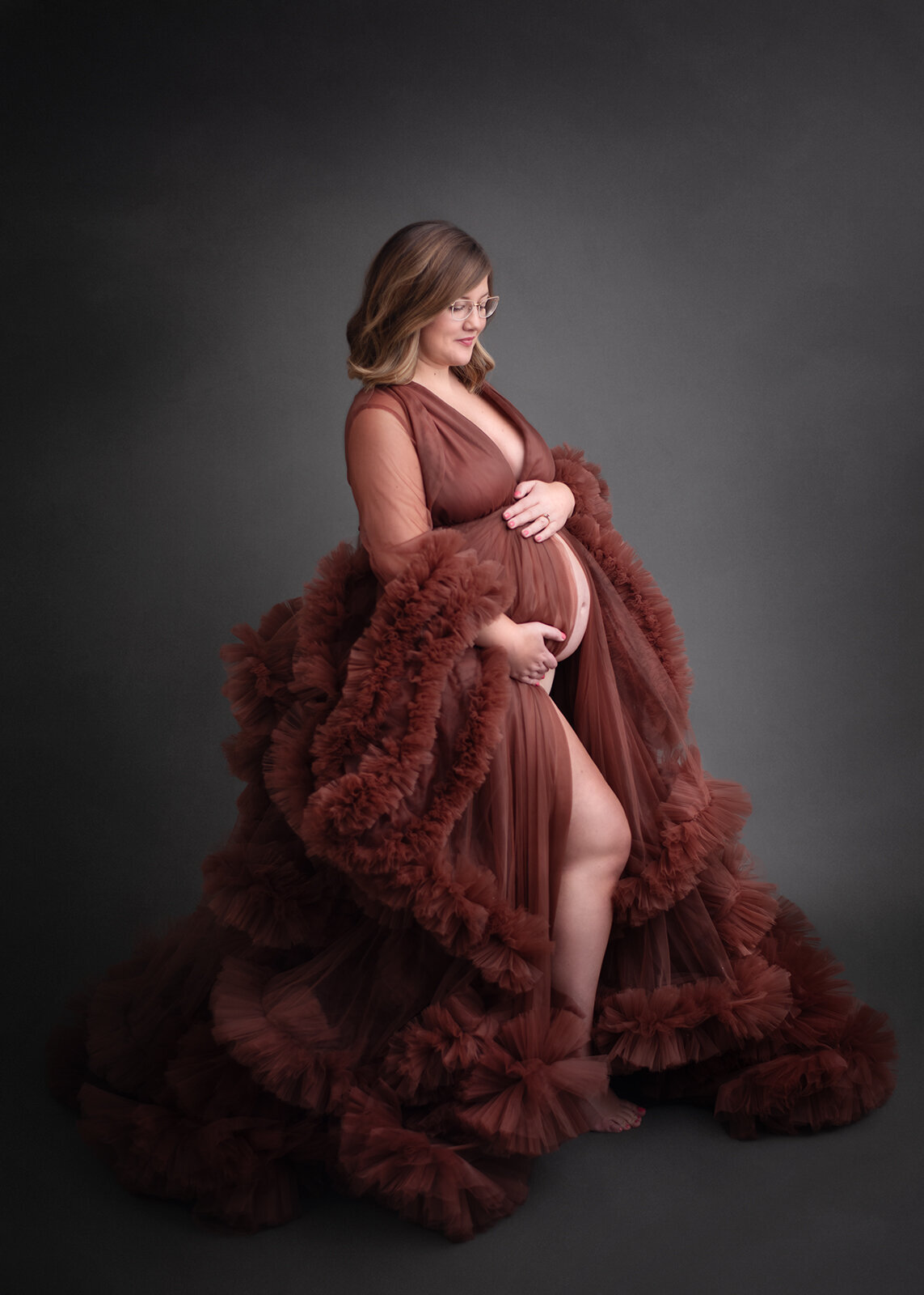 rust colored gown on pregnant mom at st. louis maternity session