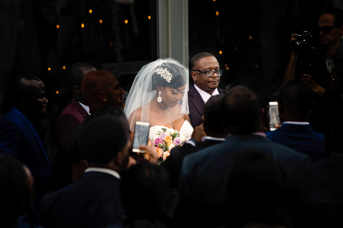 Bride coming down aisle