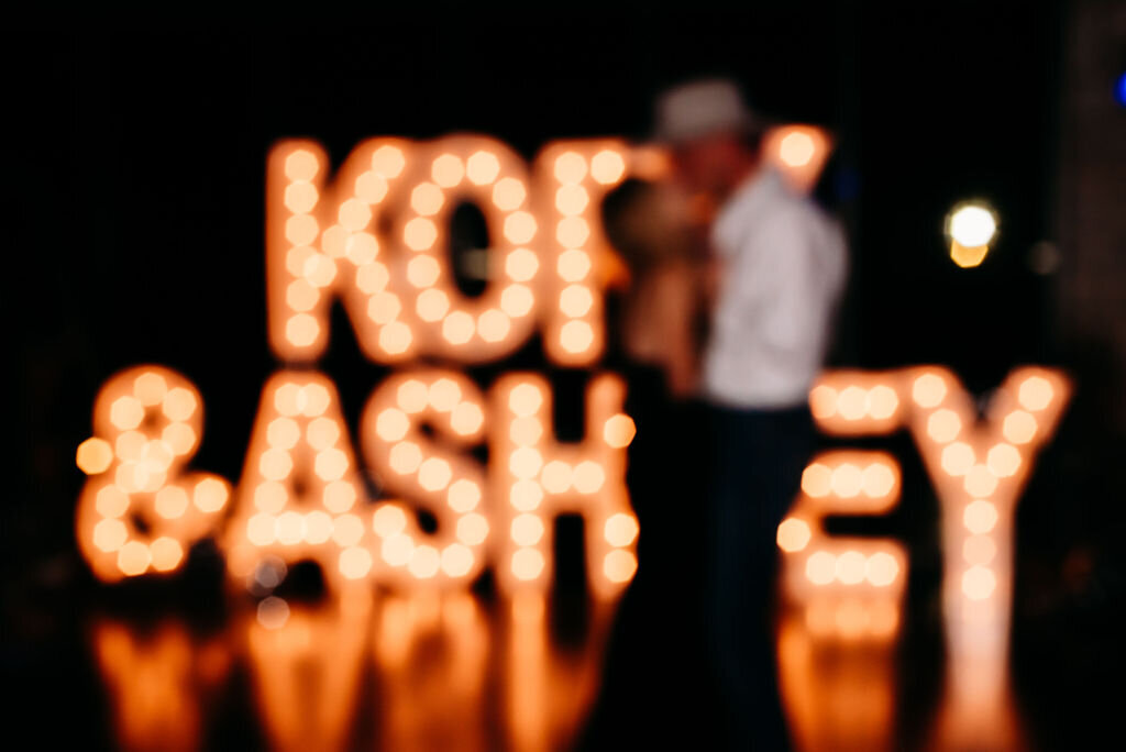 Vesper-and-Vow-Bemidji-Minnesota-wedding-and-elopement-photographer-coordinator-planner-dark-moody-blur-marquee-reception