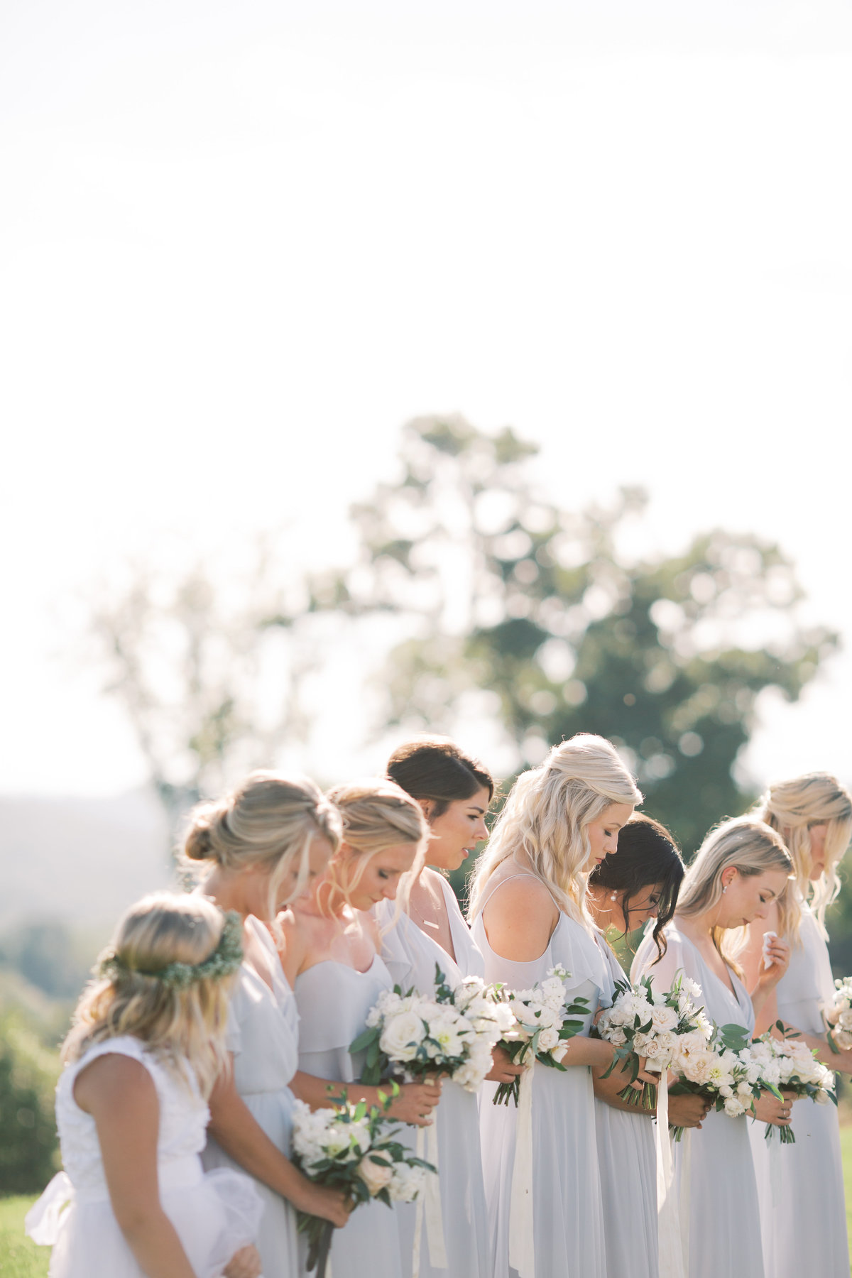 bridesmaids closing eyes during first look