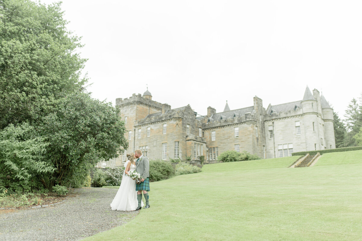Bride and Groom in the grounds of Glenapp Castle Scotland, image by Jill Cherry Porter