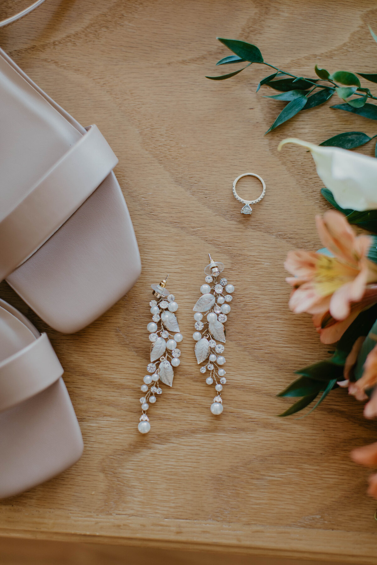 Bridal jewelry in a flat lay. 