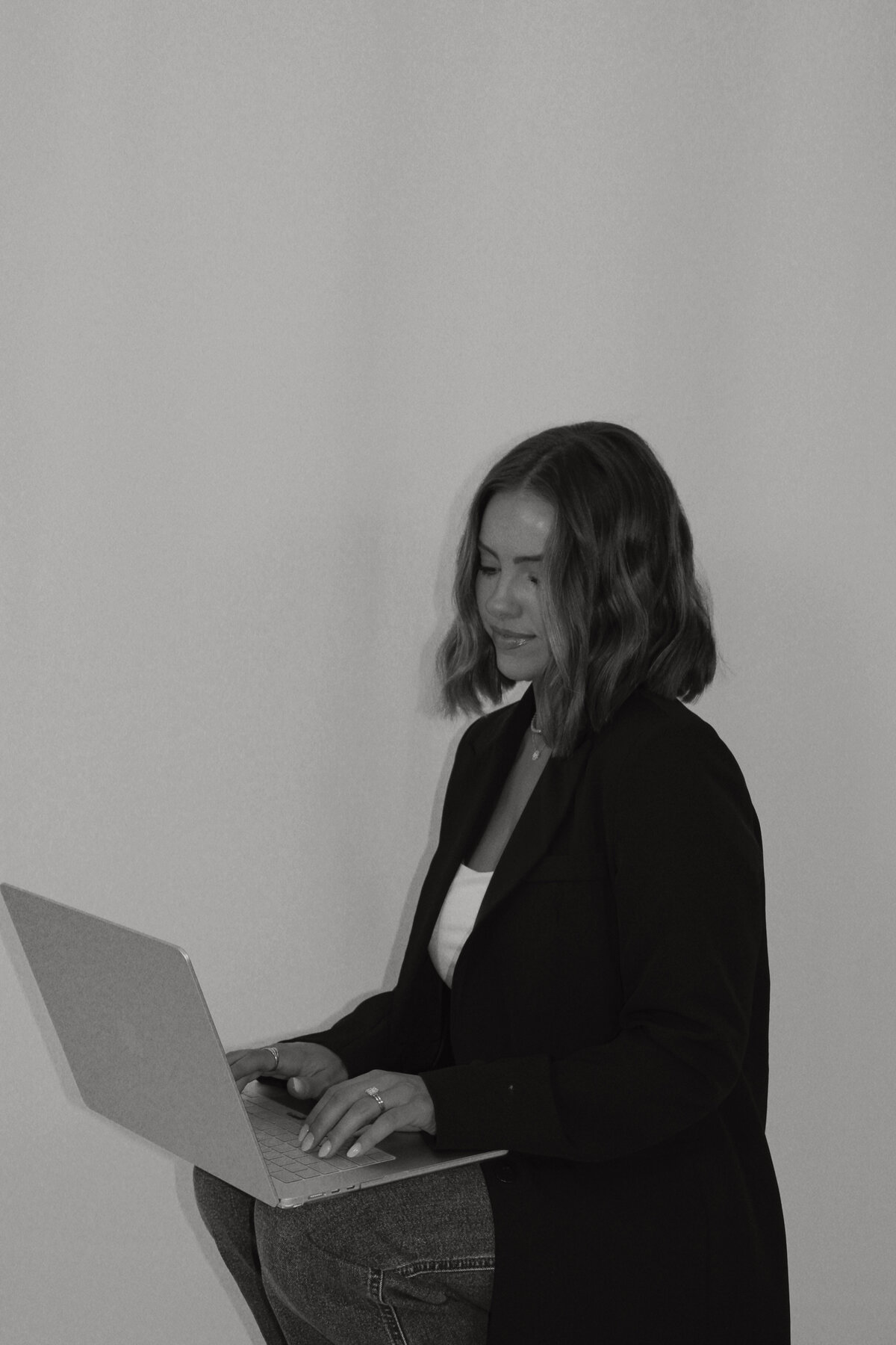 Woman working on web design and branding creation