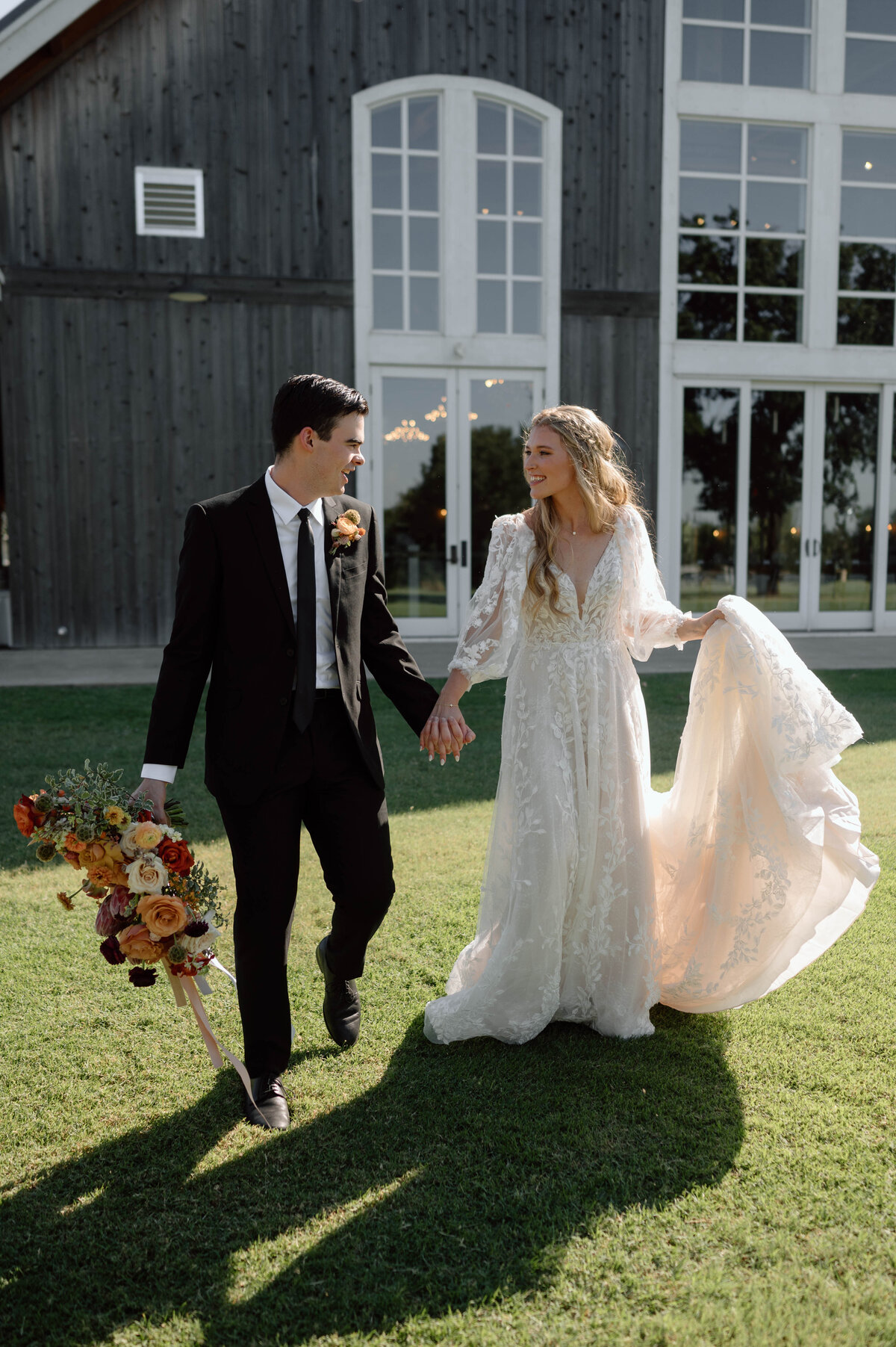 bride and groom smiling at sparrow beginnings