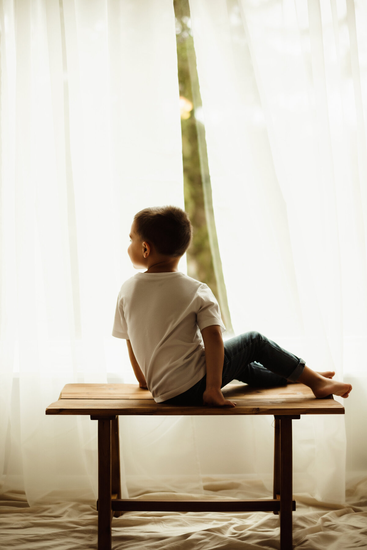 Simplistic milestone photo of little boy in central new york