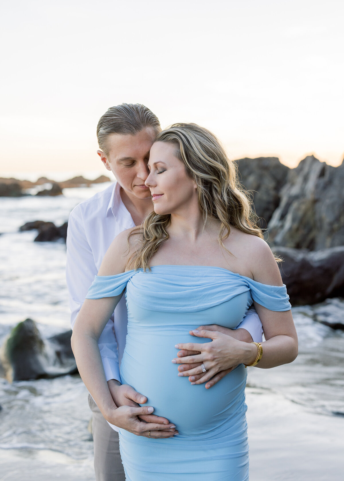 moody and romantic beach maternity photo