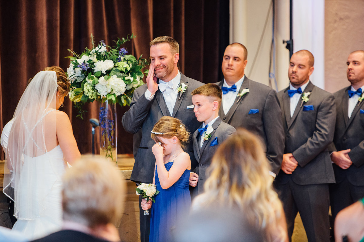 Groom and daughter crying