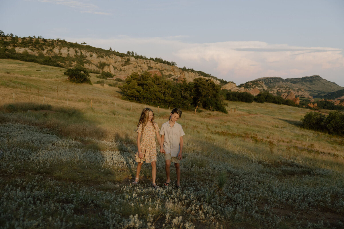 A family photoshoot in the Denver area with sweeping mountain views, ideal for capturing timeless memories of your time in Colorado