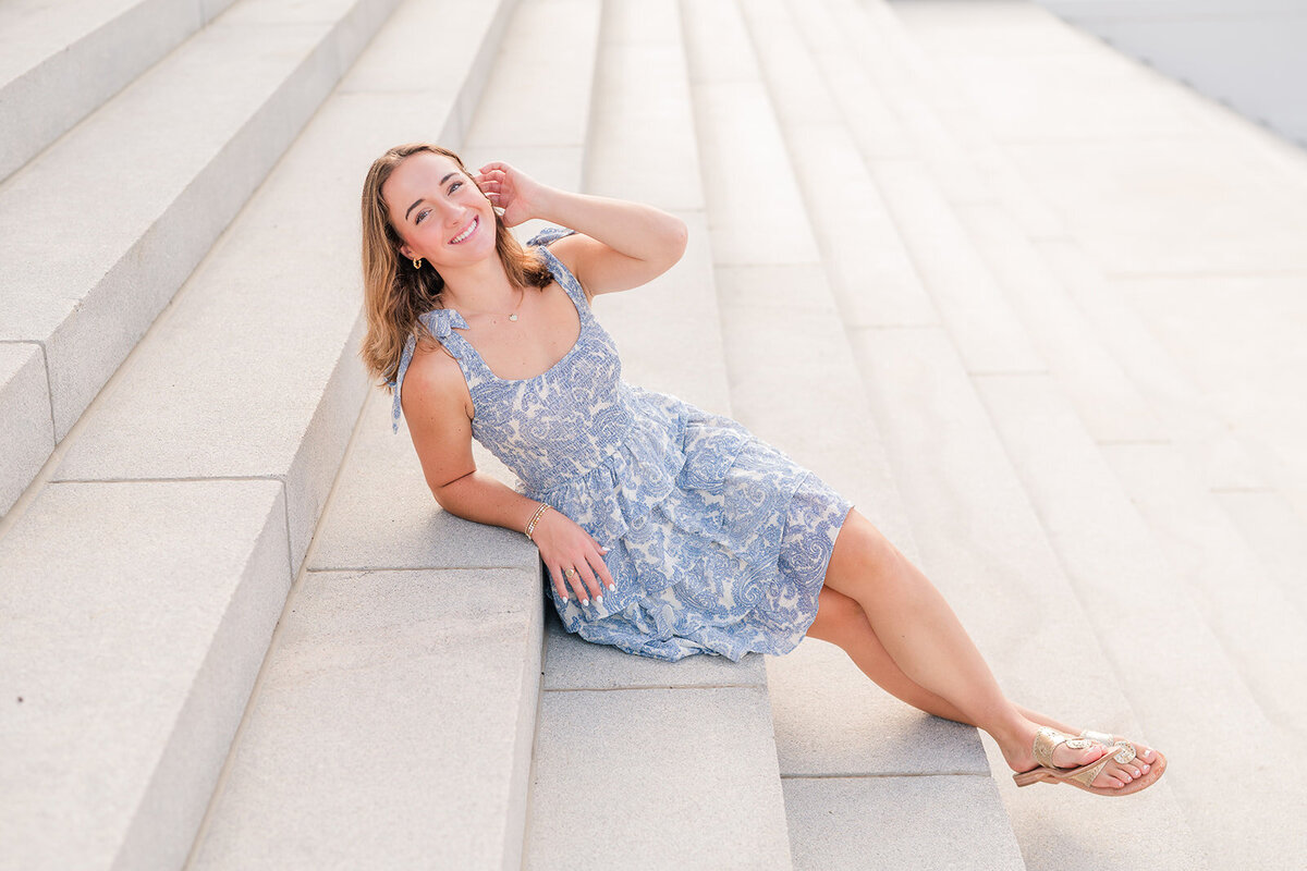 a girl posing on steps