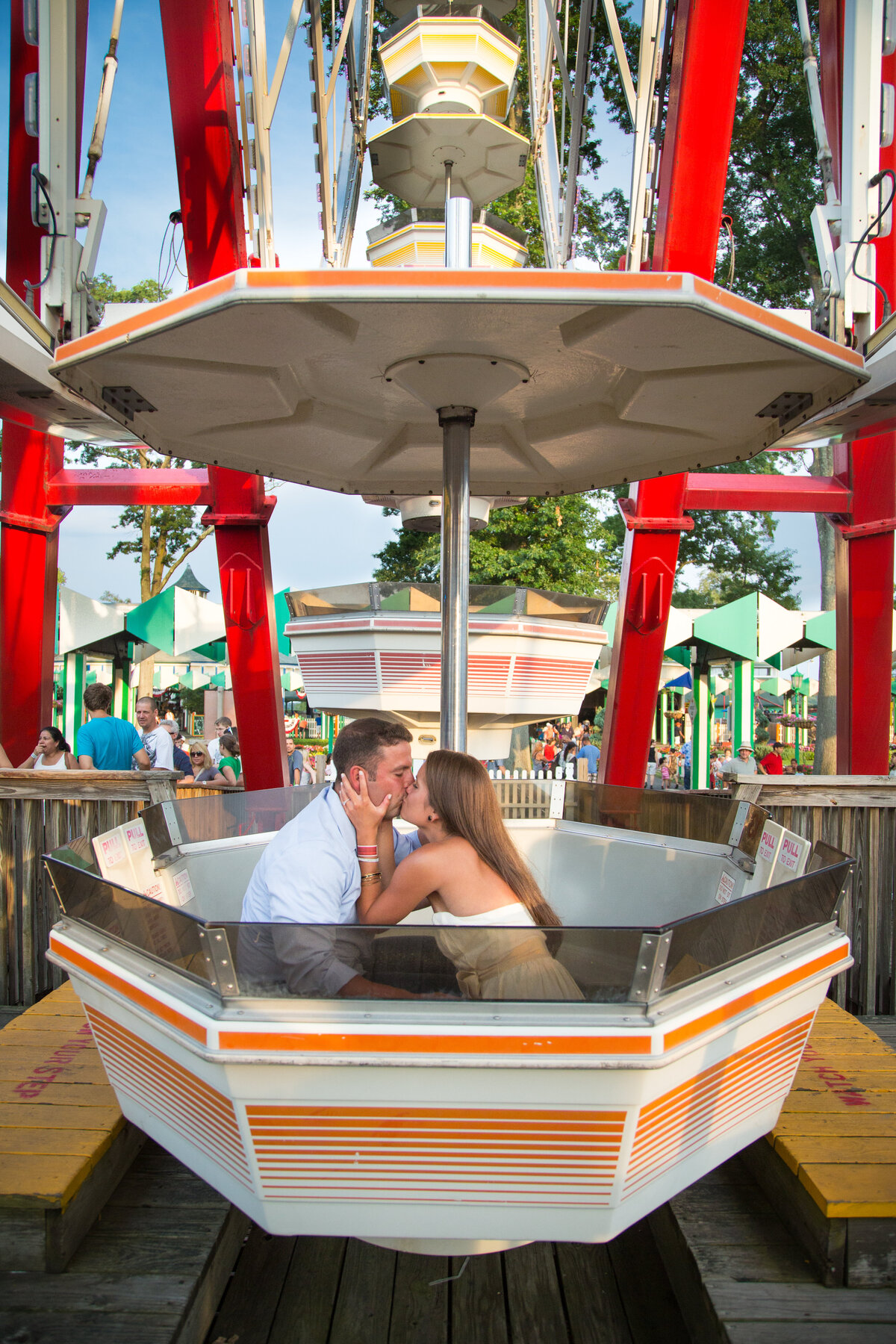 couple kissing on a ride