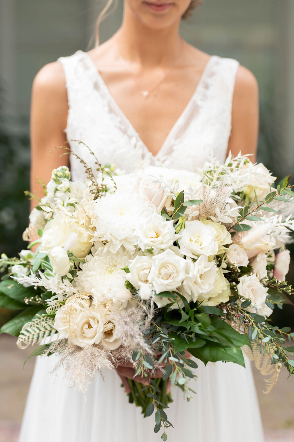 Close up of a large white wedding bouquet.