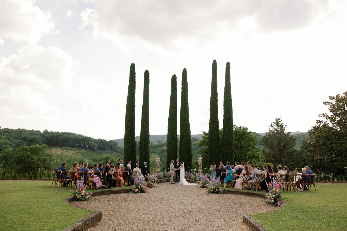 Couple exchanging vows during their Villa La Selva Ceremony