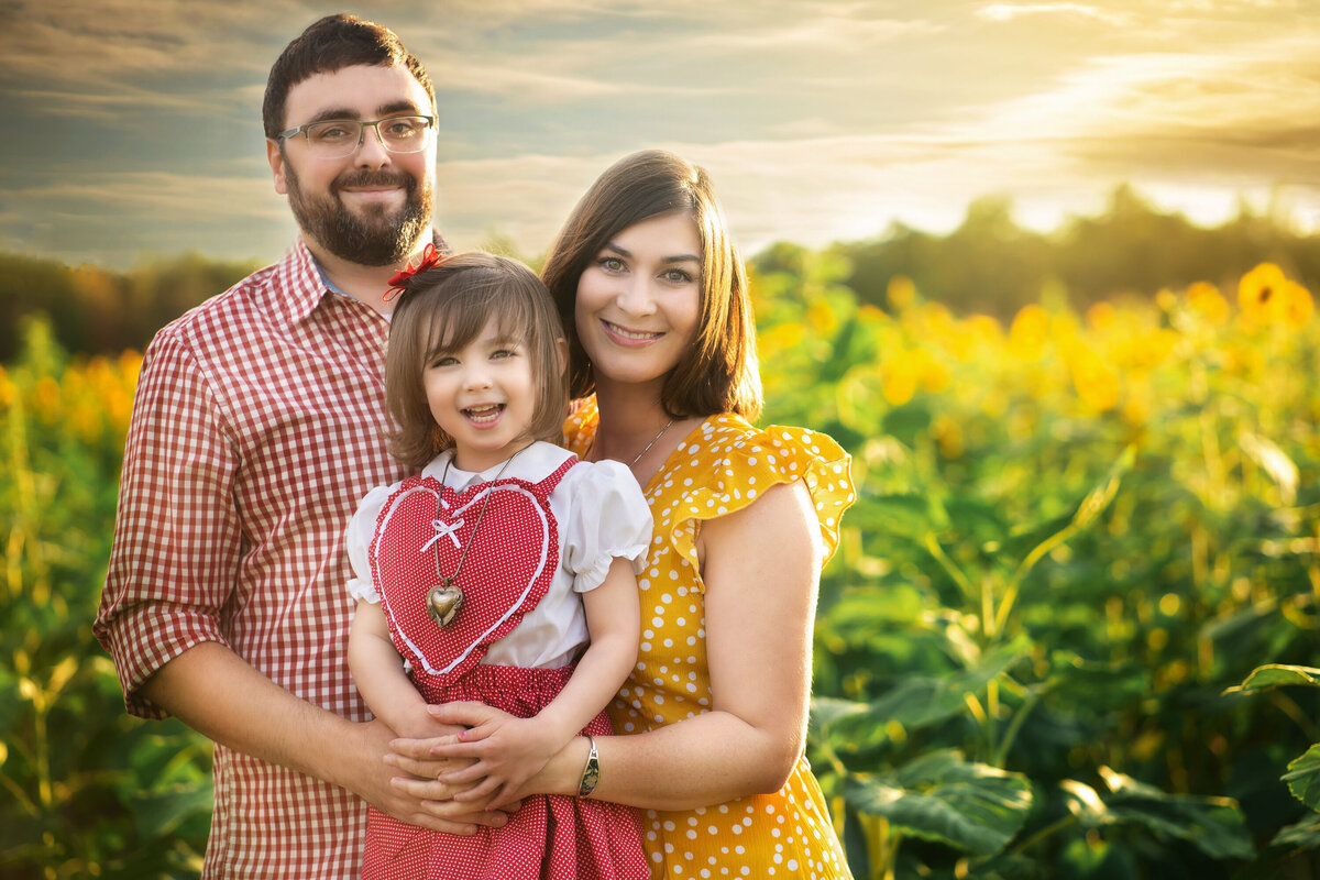 Coast Ridge Sunflowers mom dad daughter heart sunset golden hour field