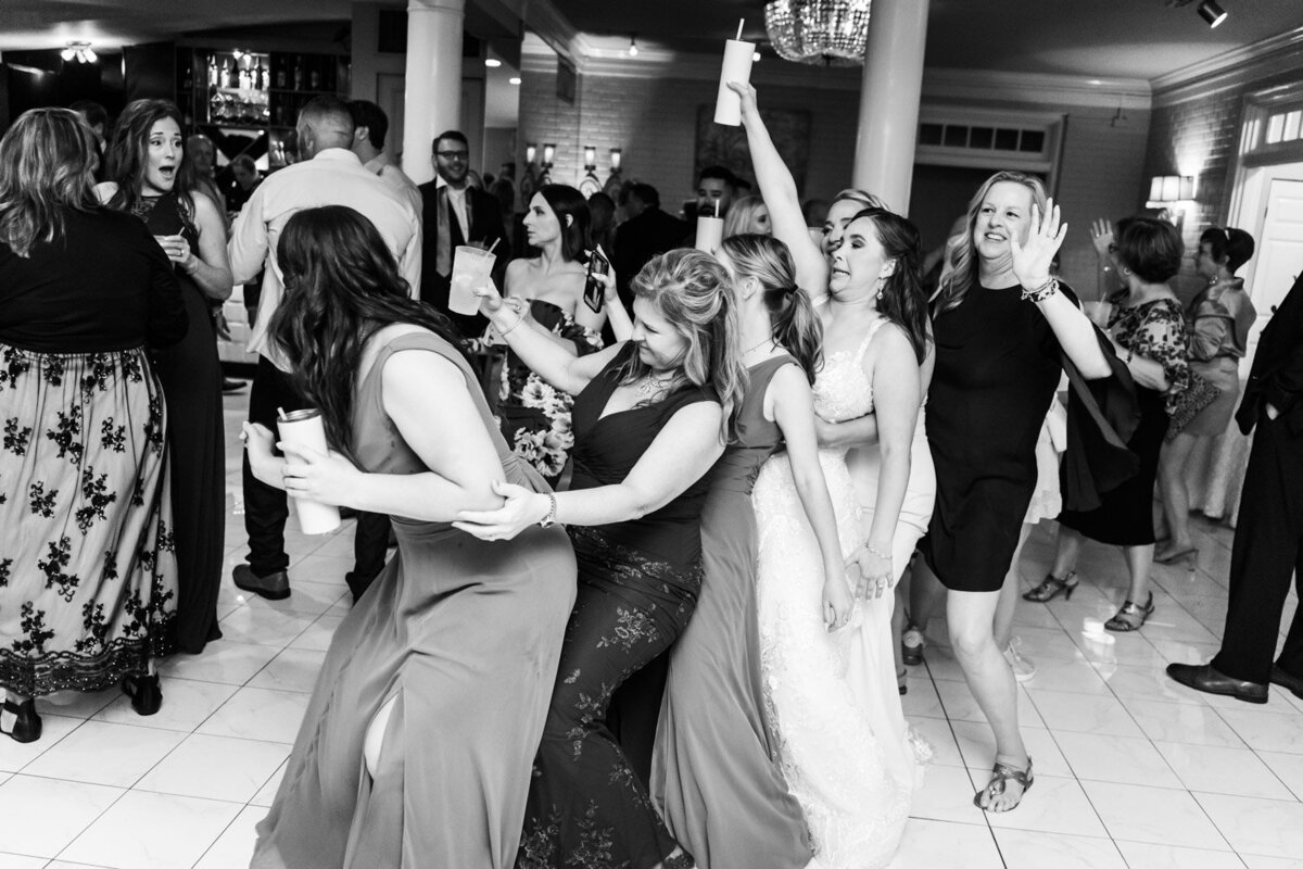 Bride and guests dancing at Southern Oaks wedding reception