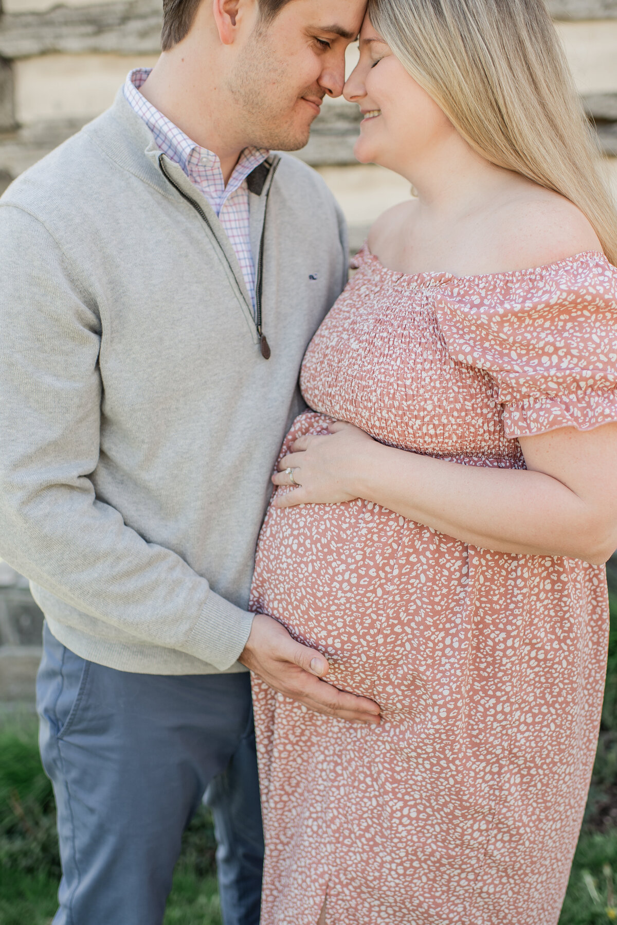 sweet adoring moment between parents to be - maryland maternity session