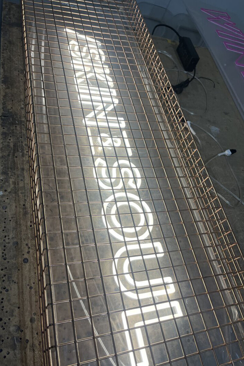 ellis-signs-custom-neon-sign-with-mesh-cage-newcastle-gateshead-north-east