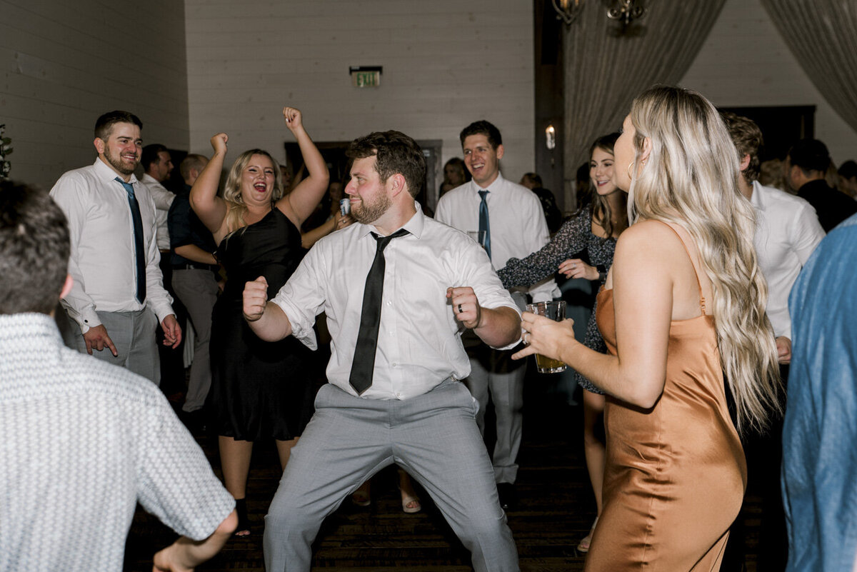 Wedding guests dance at reception