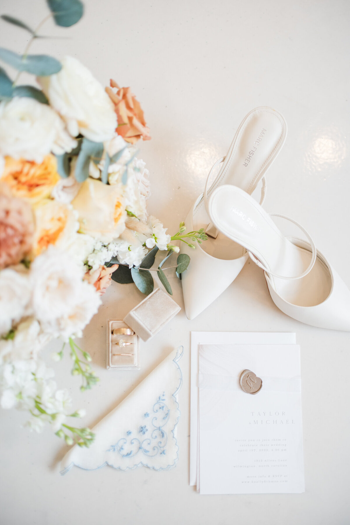 detail photos of invitation and shoes at wrightsville manor