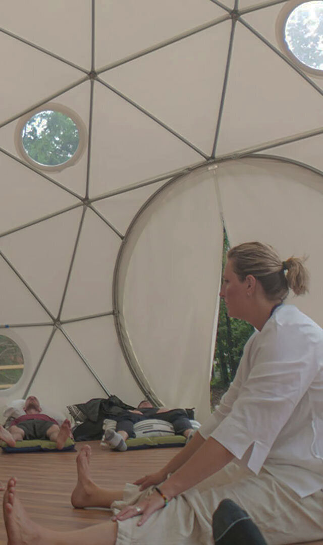 A photo of the founders wife during one of the events taking place  during a veteran retreat in the Rising Ridge dome.