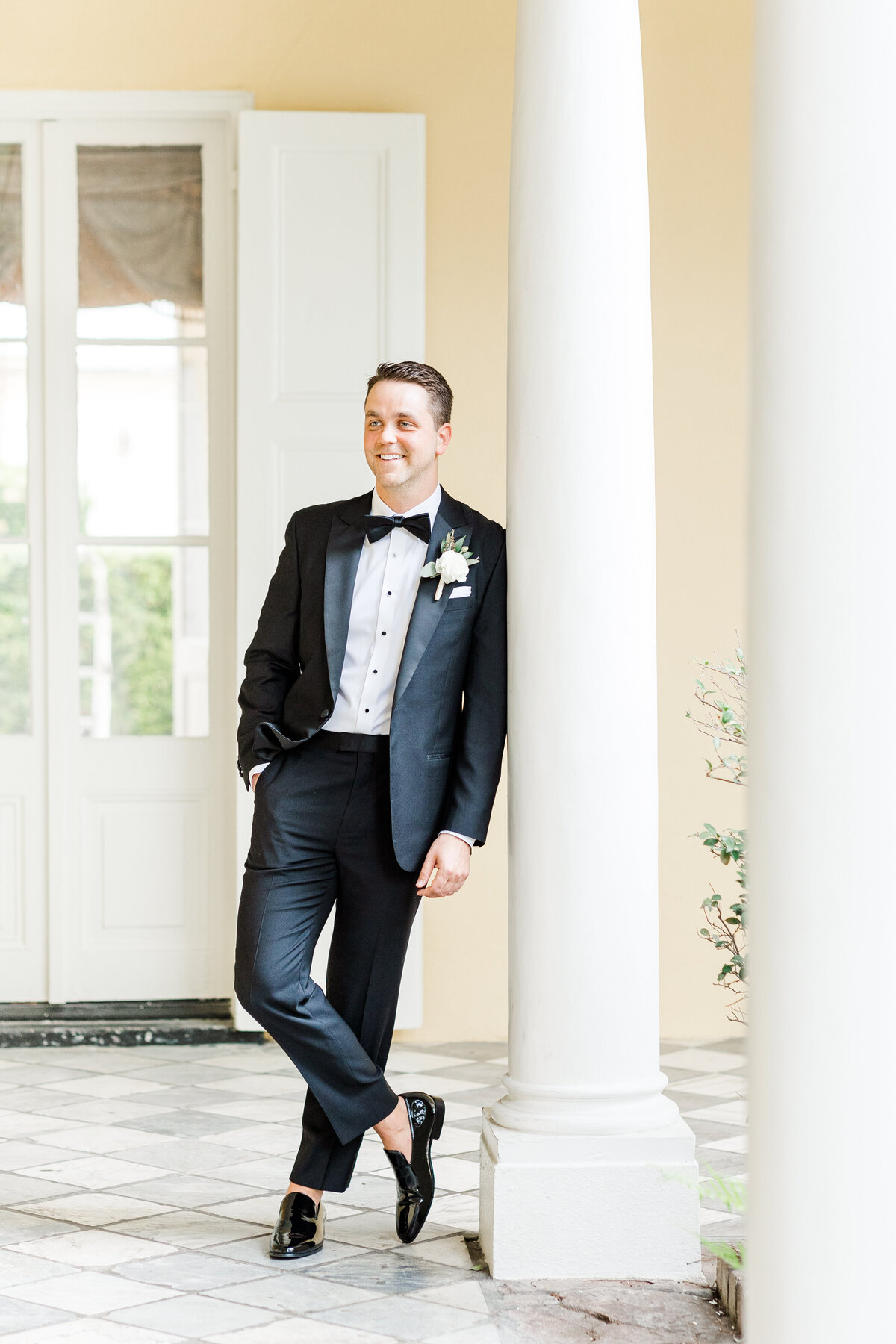 groom smiling at bride at the william aiken house