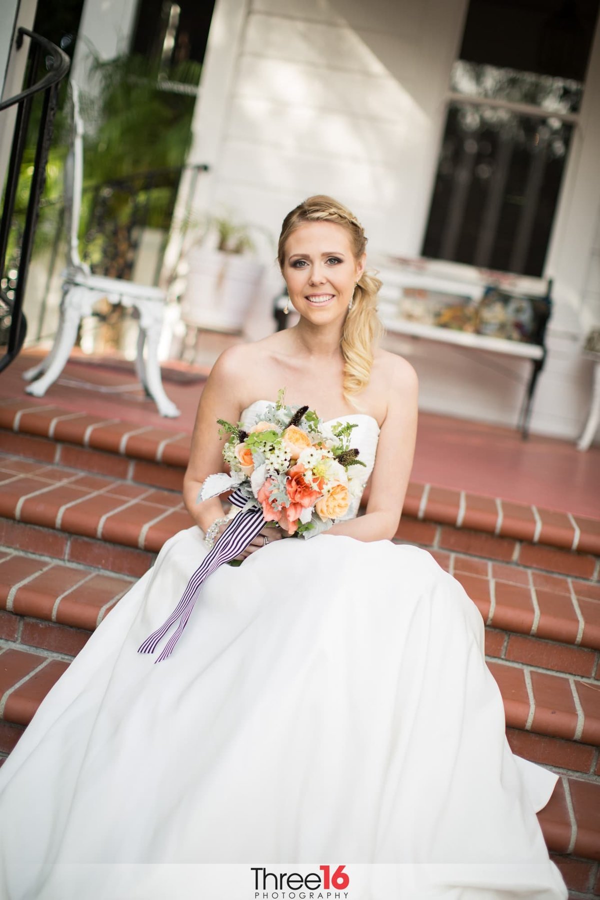 Bride poses in front of the Jones Victorian Wedding Venue