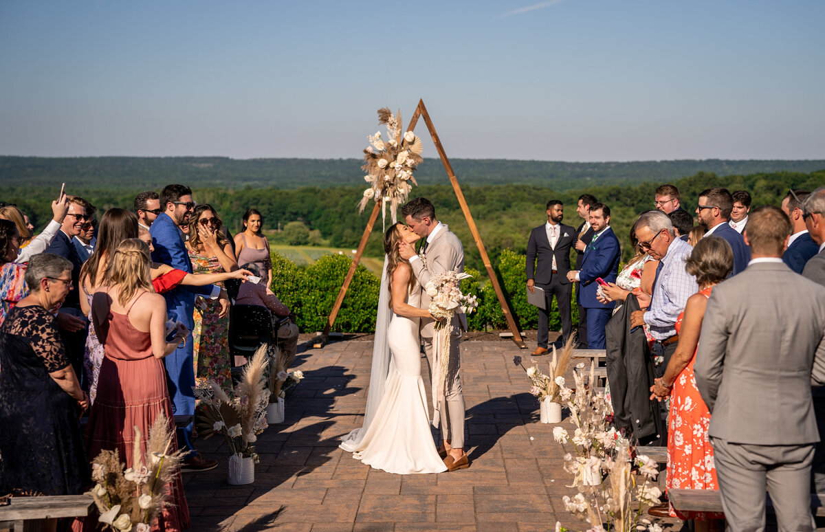 the-overlook-at-geer-tree-farm-griswold-ct-modern-boho-wedding-ceremony-arch-petals-plates-07