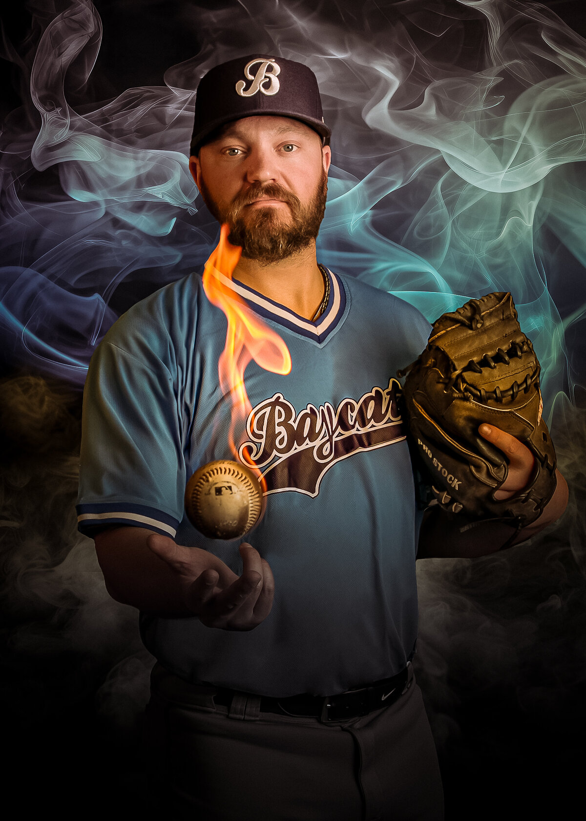 Barrie Baycats back catcher James Anderson holding a baseball that is on fire.  Creative and artistic background. 