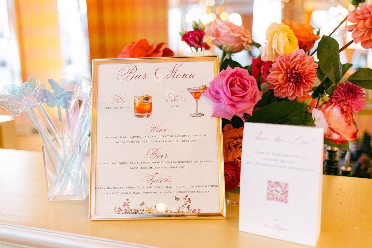 A wedding day photo showing the cocktail menu at the wedding reception