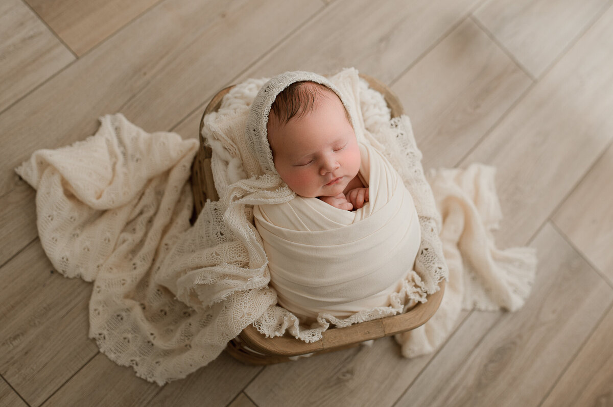 All white scene newborn studio