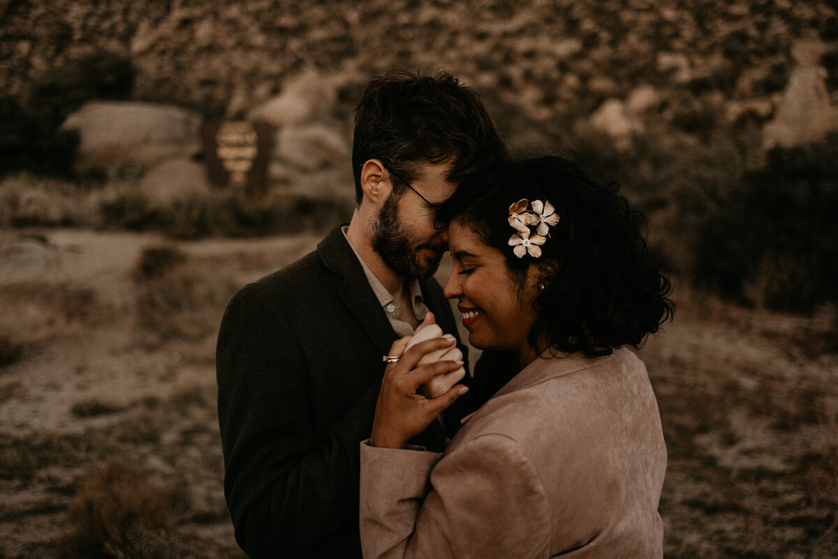 newlyweds kissing on the Sandia foothills in Albuquerque