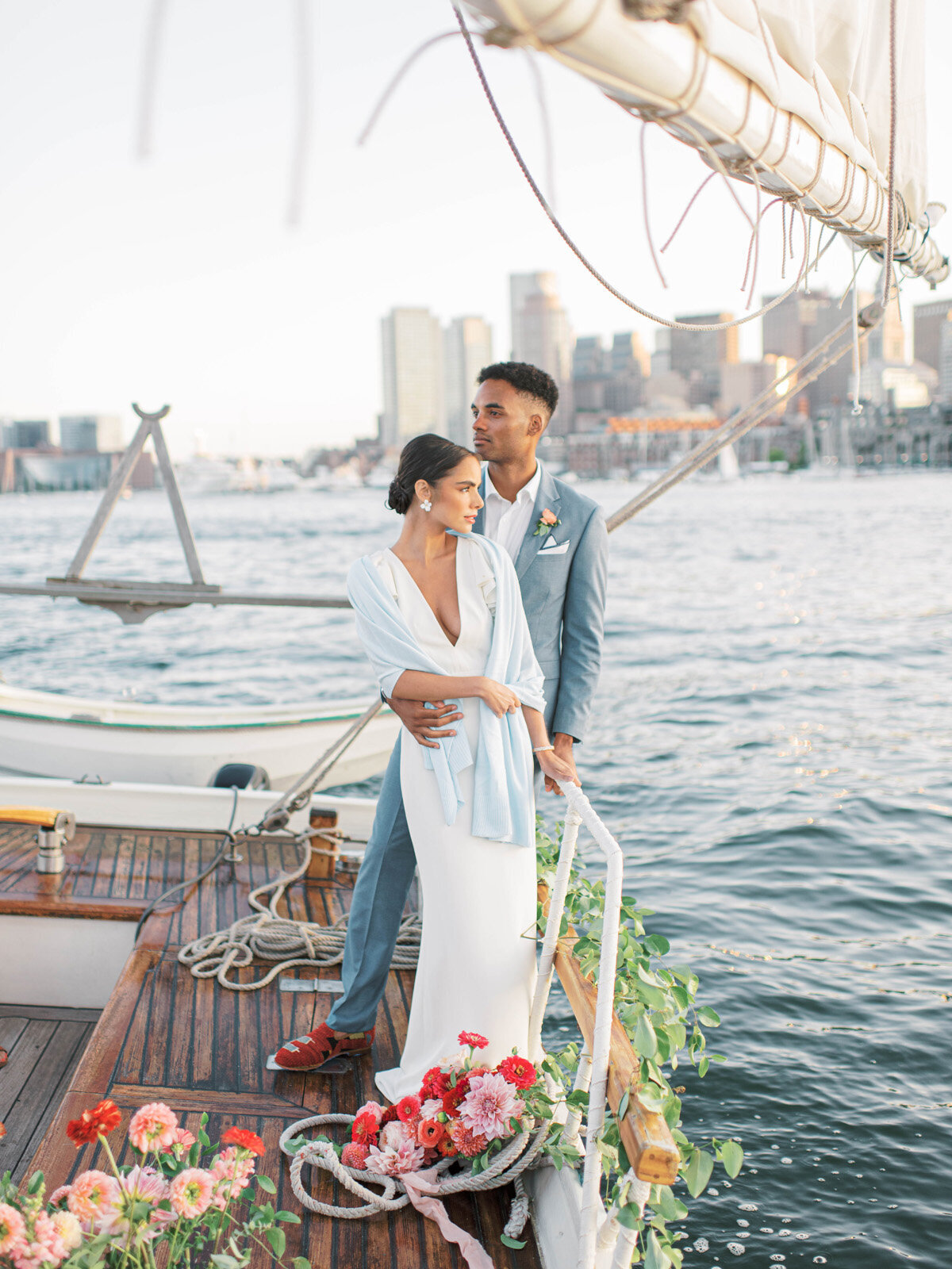 Kate-Murtaugh-Events-elopement-wedding-planner-Boston-Harbor-sailing-sail-boat-yacht-greenery-water-city-skyline-couple-married
