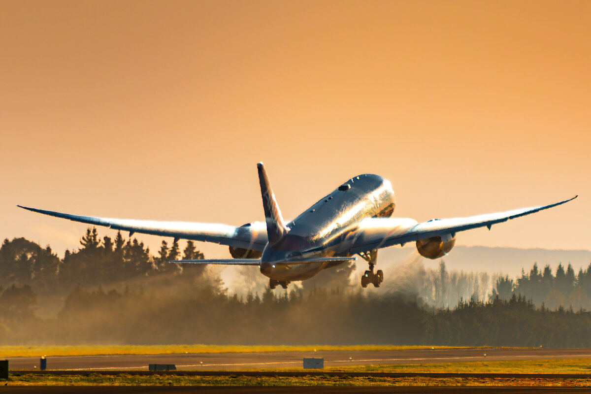 plane at sunset in ariport