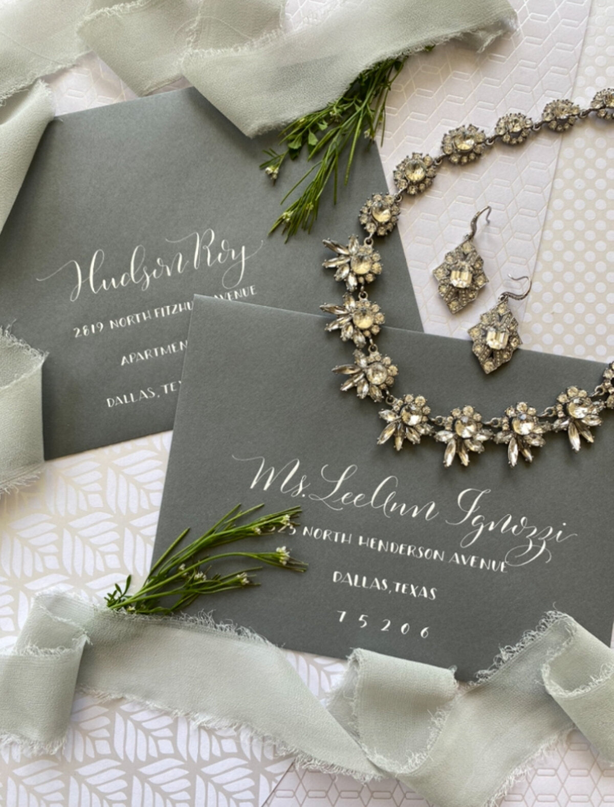 Modern envelope with calligraphy by Scribble Savvy with jewelry details
