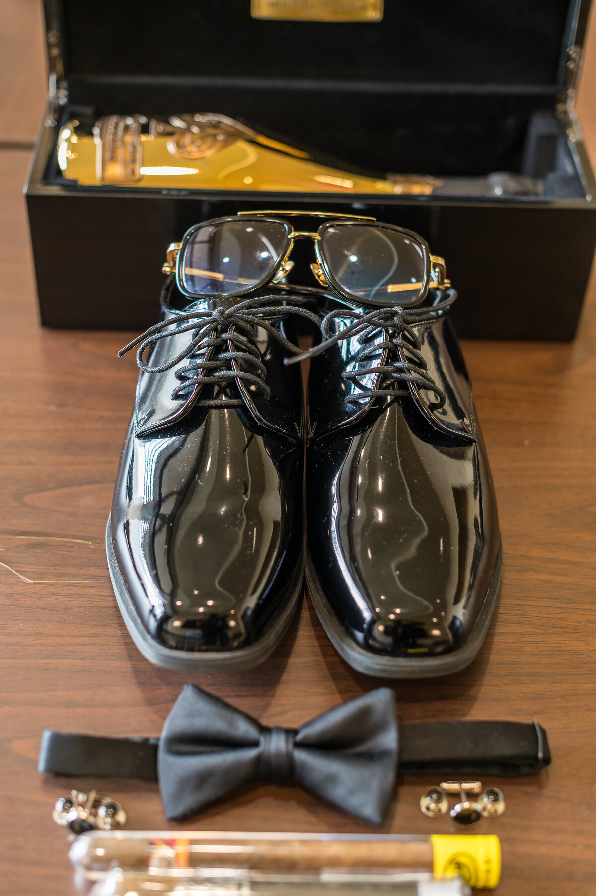 Shoes and glasses of the groom