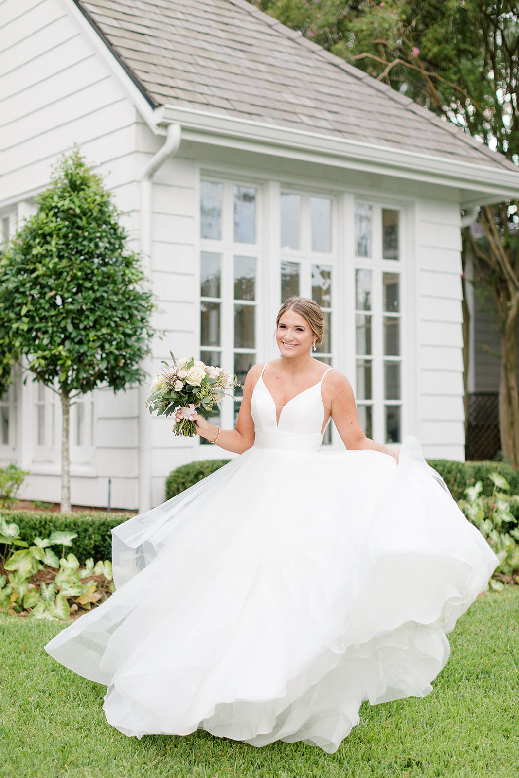 bride twirling in wedding dress