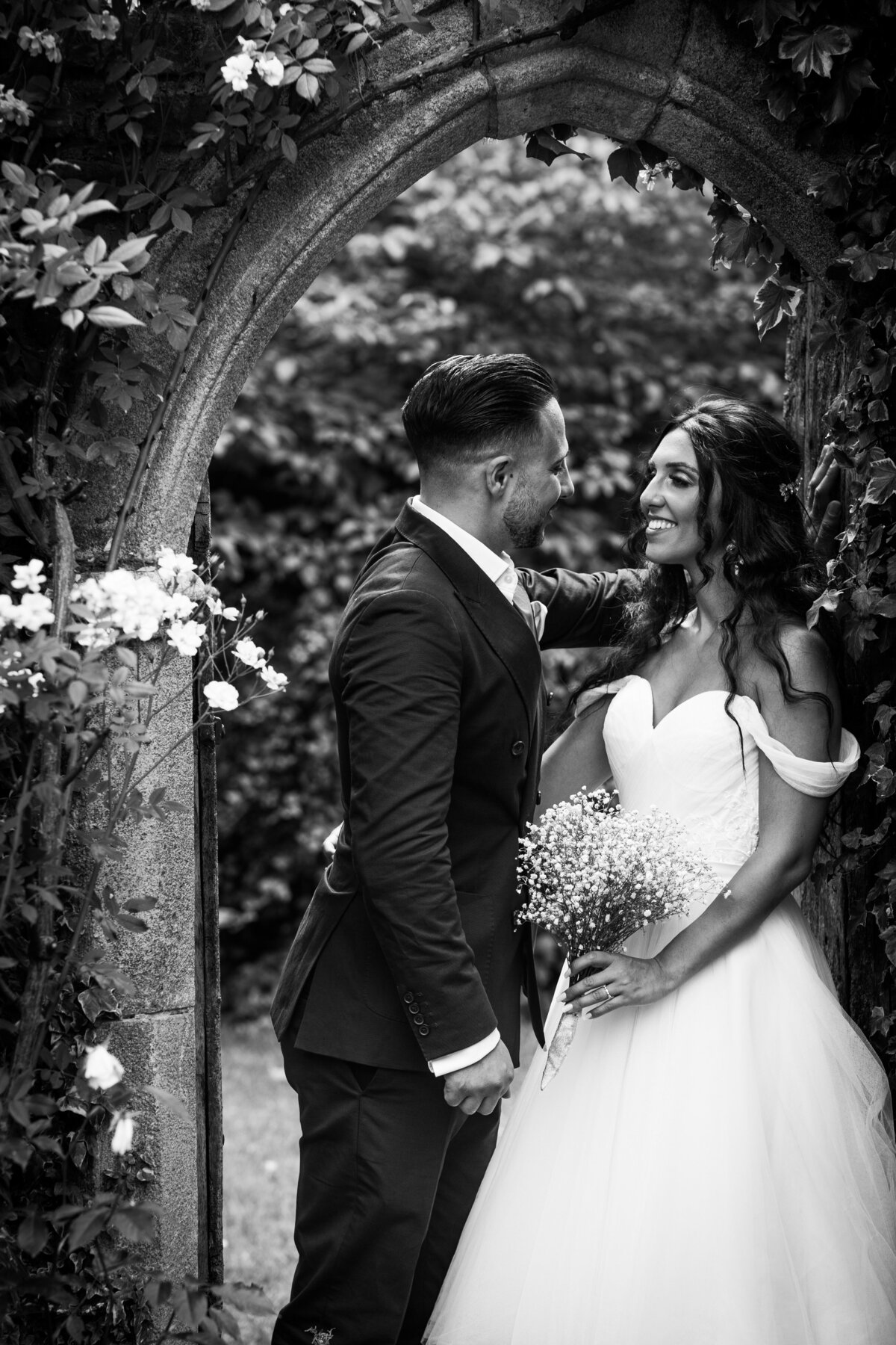 Wedding Photographer based in London capturing a candid laugh between the bride and groom.