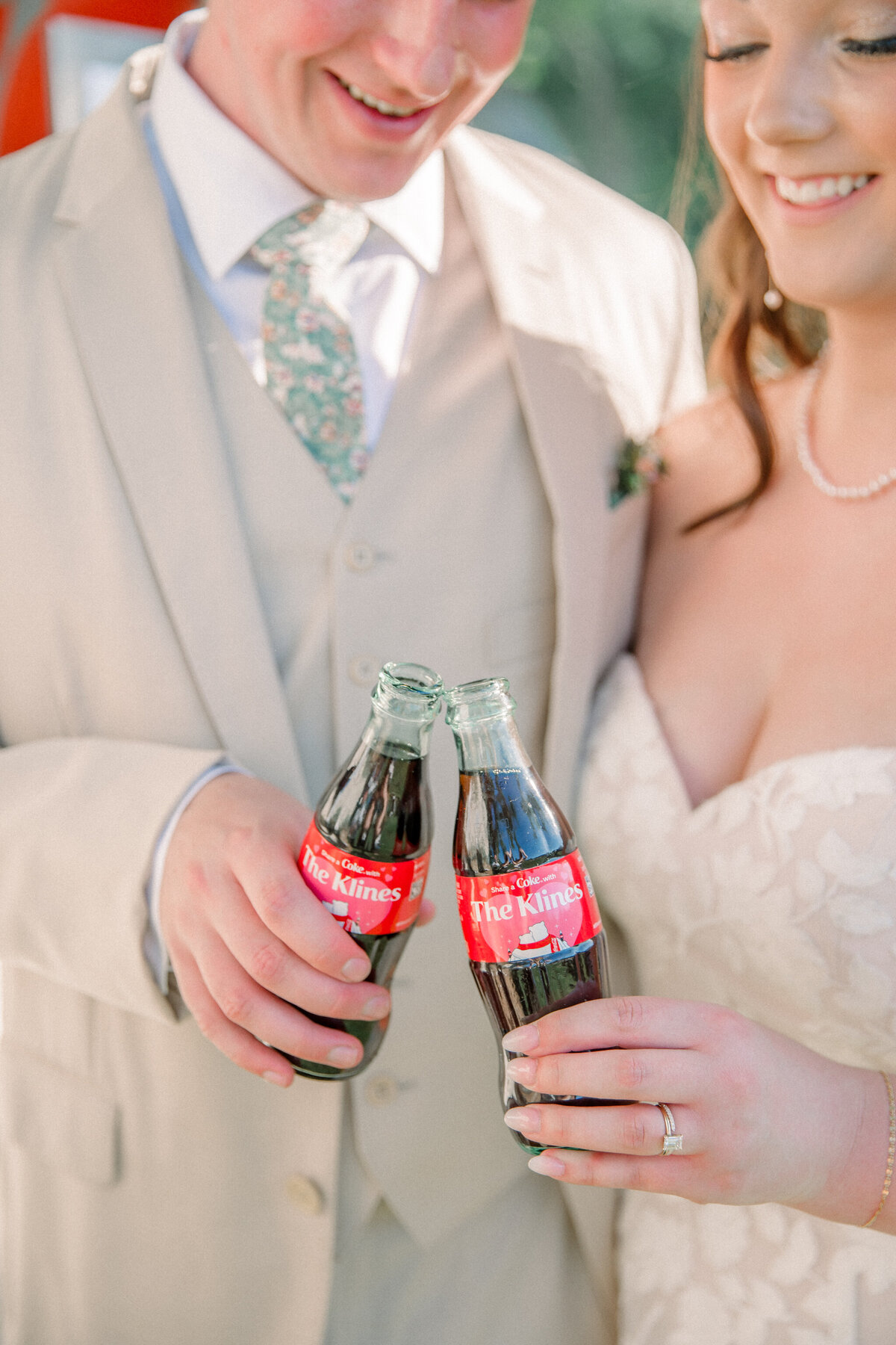 Three Oaks Manor Wedding | bride and groom hold personalized glass Coke bottles