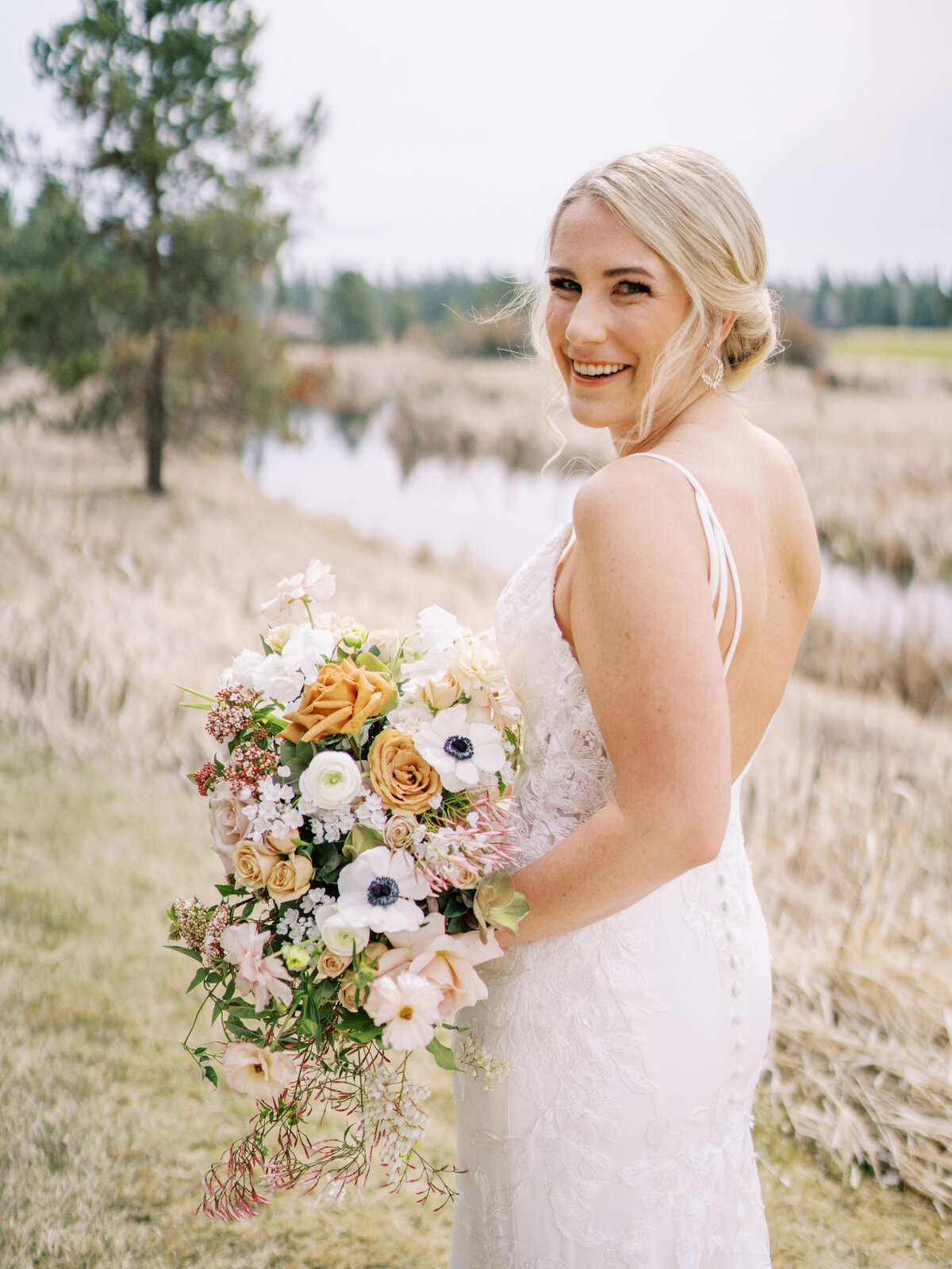 whimsical bride with colorful bouquet