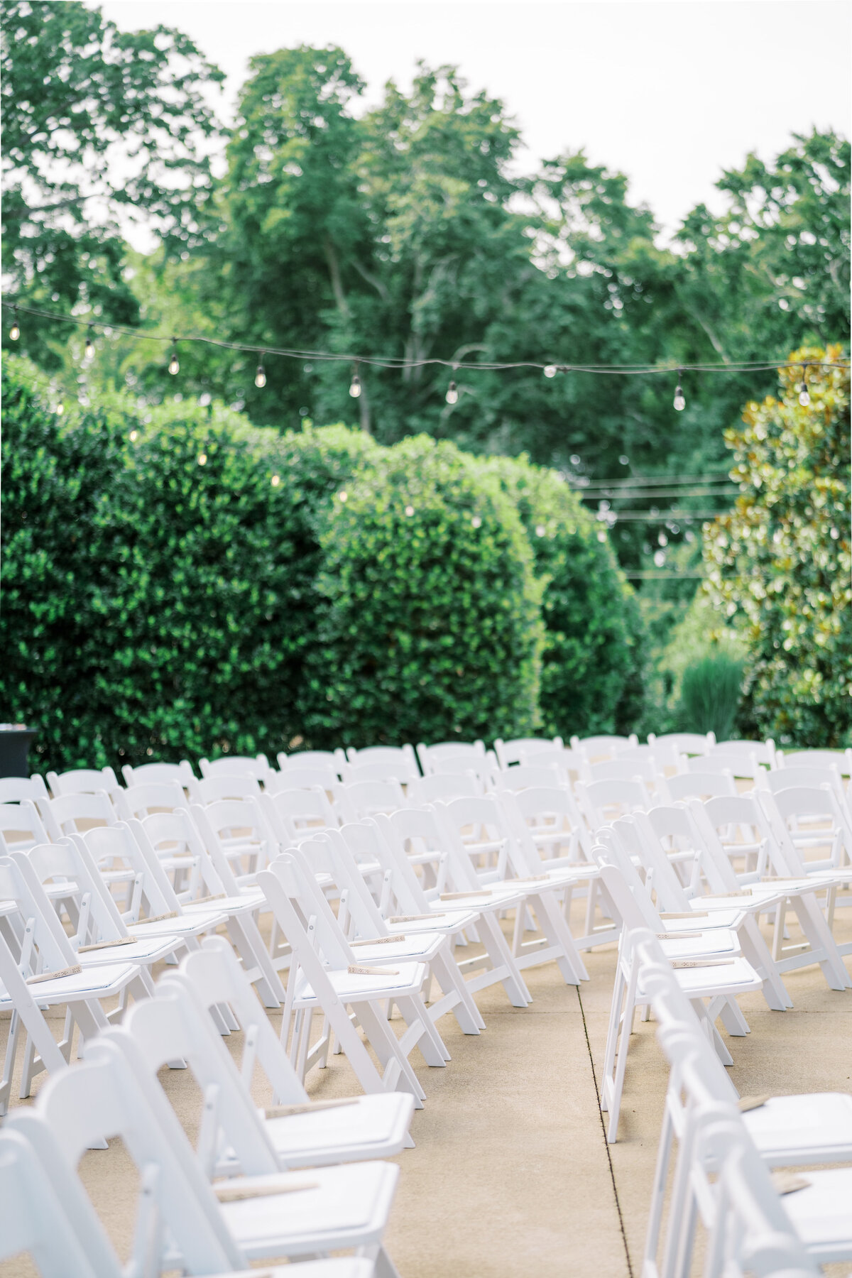 outdoor wedding ceremony on terrace with string lights