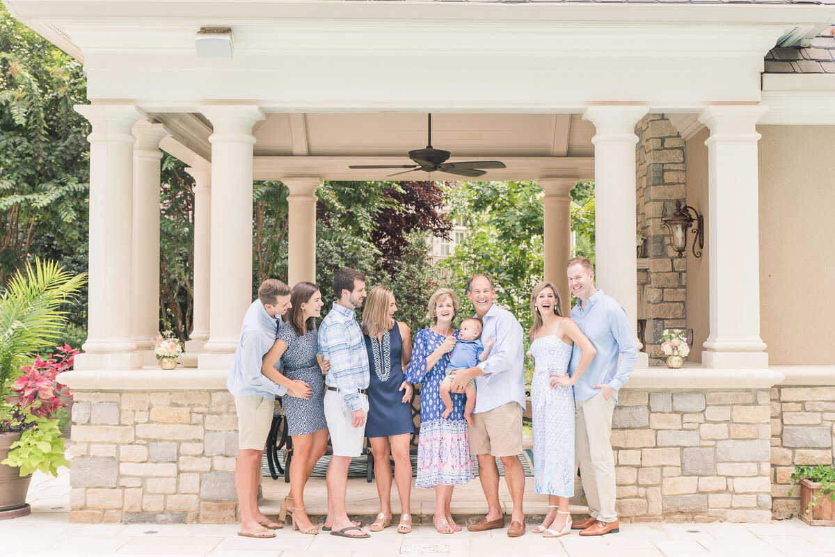 multigenerational family wearing blue in stone cabana