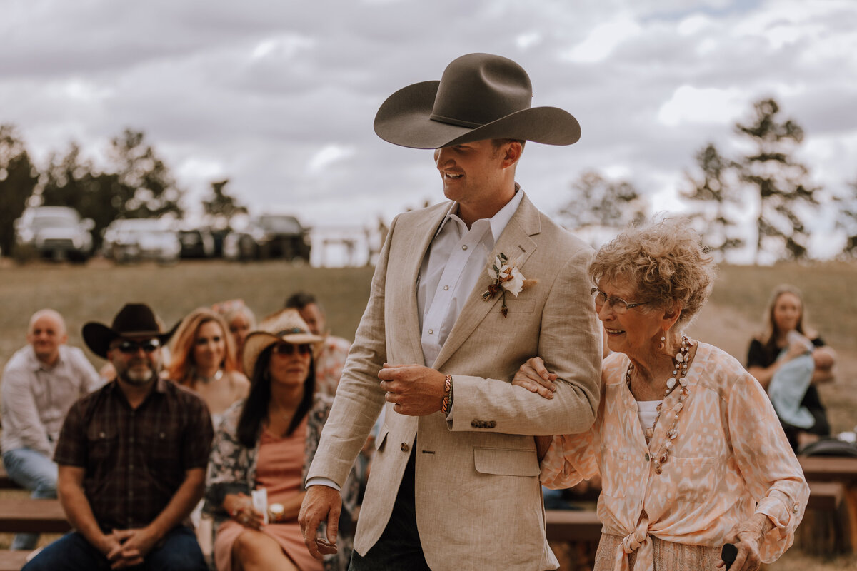 groom escorting grandma