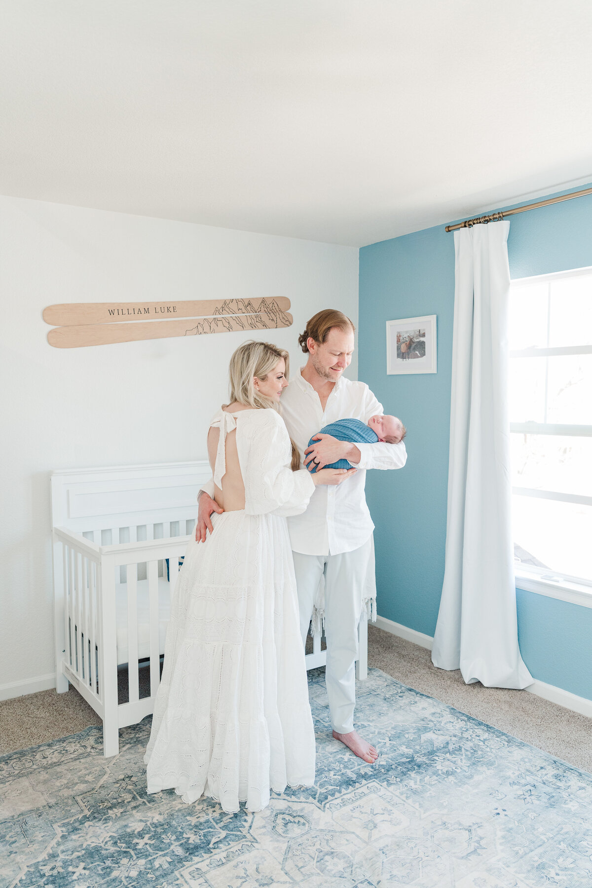 Light and neutral baby boy in home lifestyle newborn photos colorado elena spraguer photography 0038