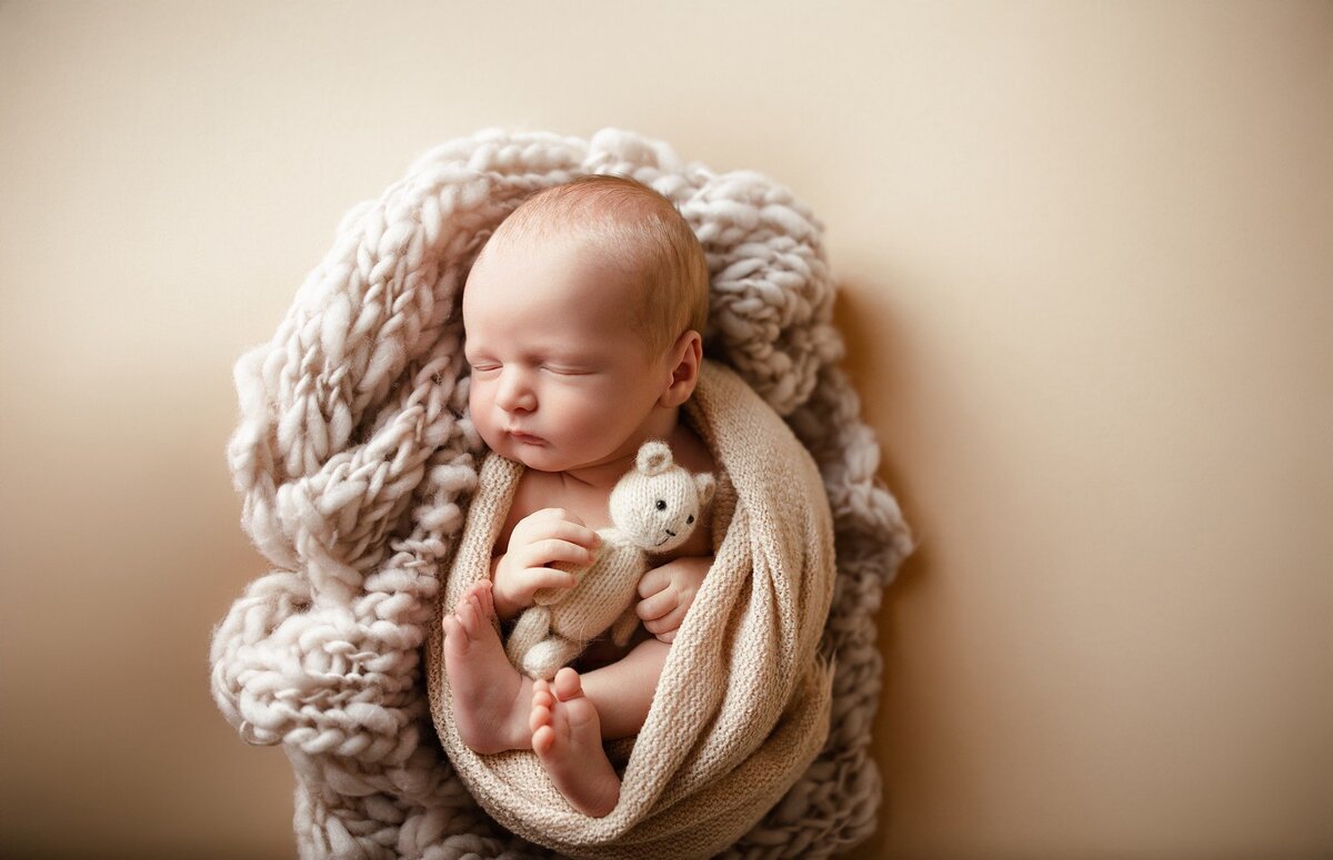 wrapped-baby-on-blanket-Little-Elm