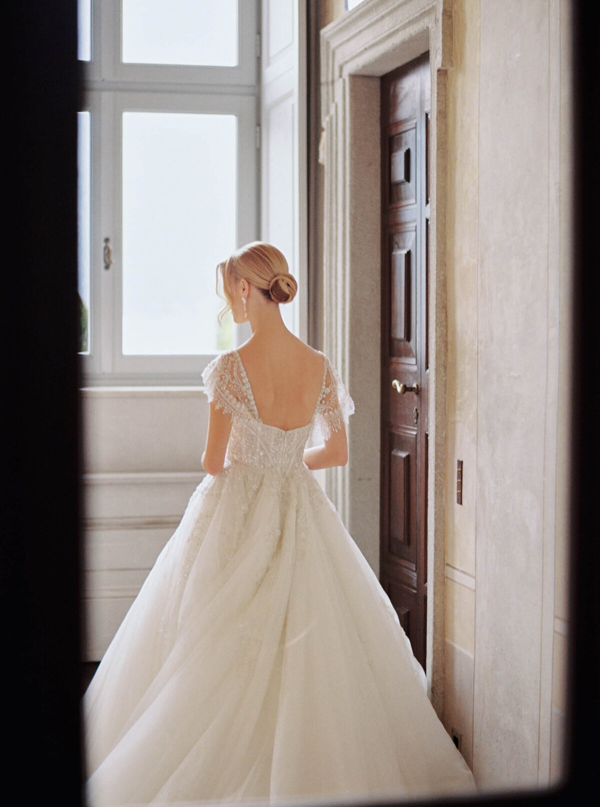 A wedding photo of a bride in her white wedding dress at Villa Balbiano on Lake Como in Italy