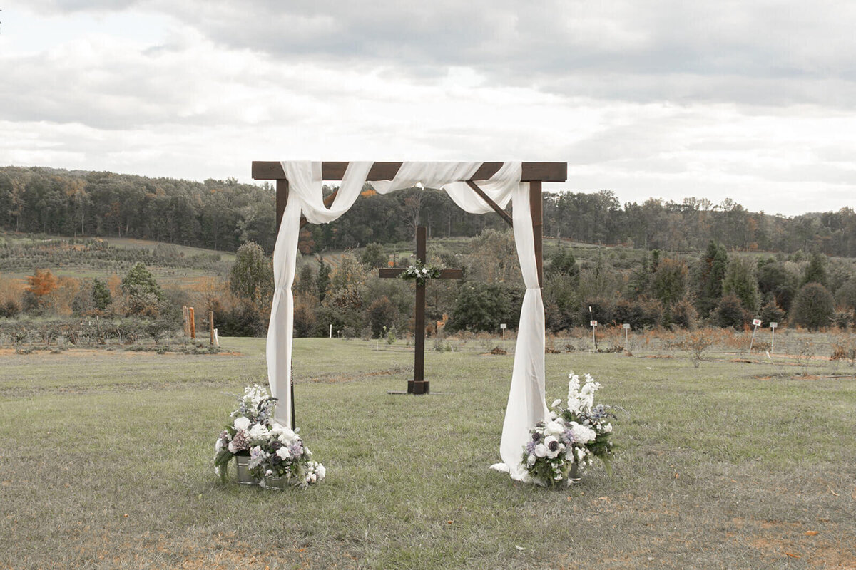 wedding ceremony arch with fabric